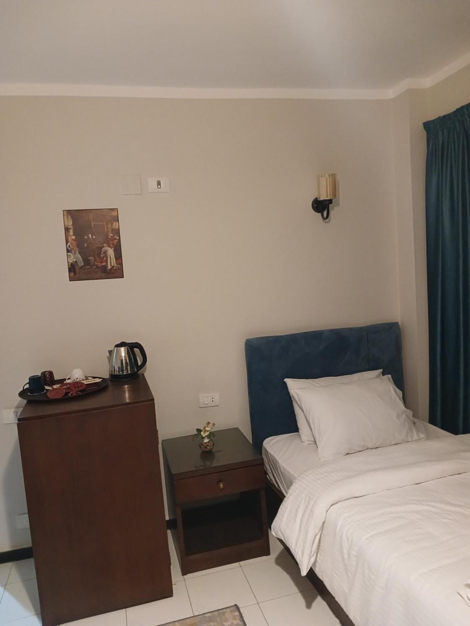 Pyramids Way Inn Kafret el-Gabal Esterno foto